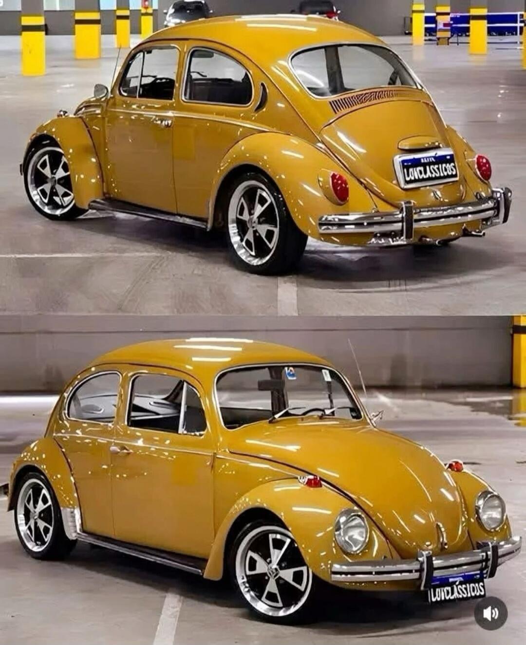 Yellow vintage Volkswagen Beetle car in a parking garage. The license plate reads LOUDCLASSICS.