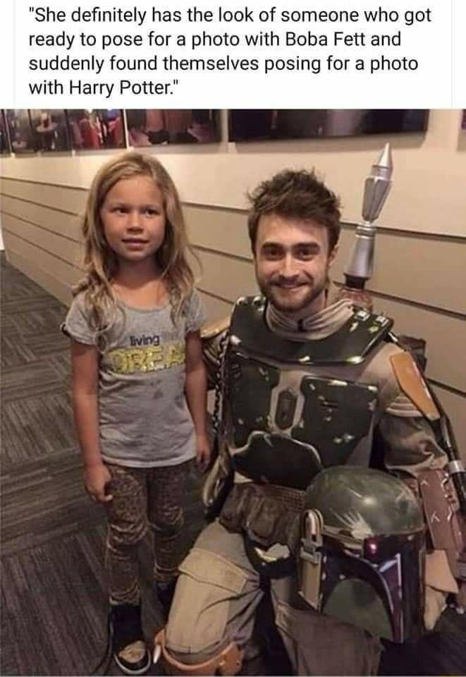She definitely has the look of someone who got ready to pose for a photo with Boba Fett and suddenly found themselves posing for a photo with Harry Potter