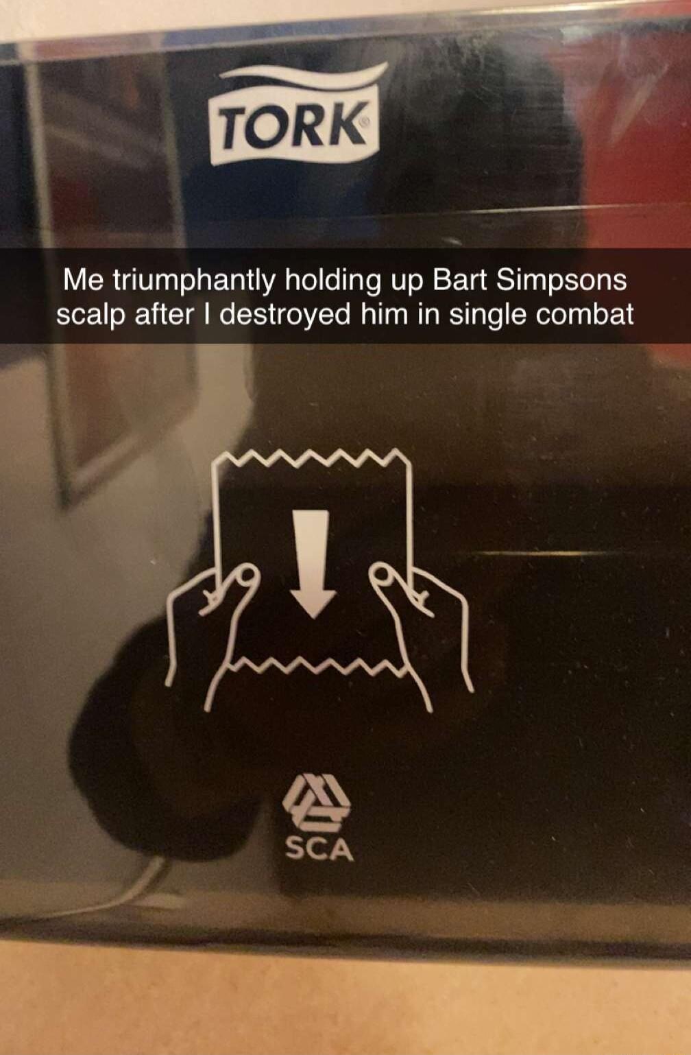 Me triumphantly holding up Bart Simpsons scalp after destroyed him in single combat