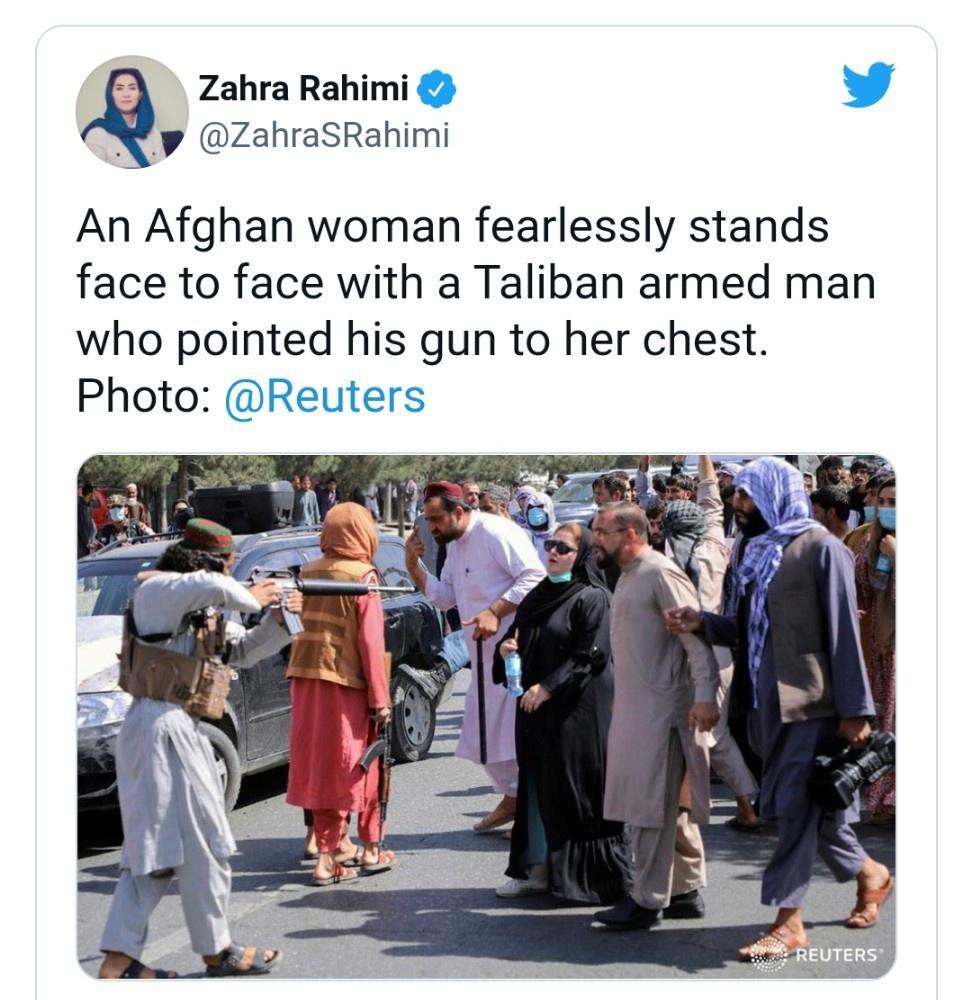 Zahra Rahimi Xy ZahraSRahimi An Afghan woman fearlessly stands face to face with a Taliban armed man who pointed his gun to her chest Photo Reut