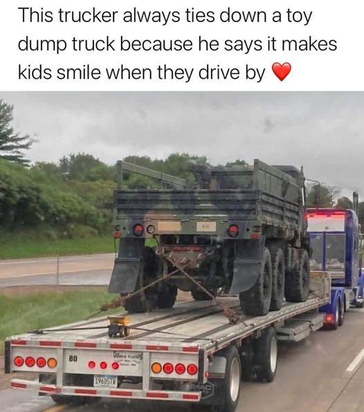 This trucker always ties down a toy dump truck because he says it makes kids smile when they drive by